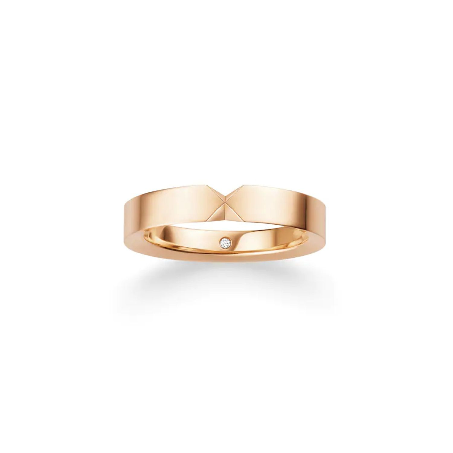 Triumph wedding ring 4.5mm pink gold set with a secret diamond in the body of the ring.